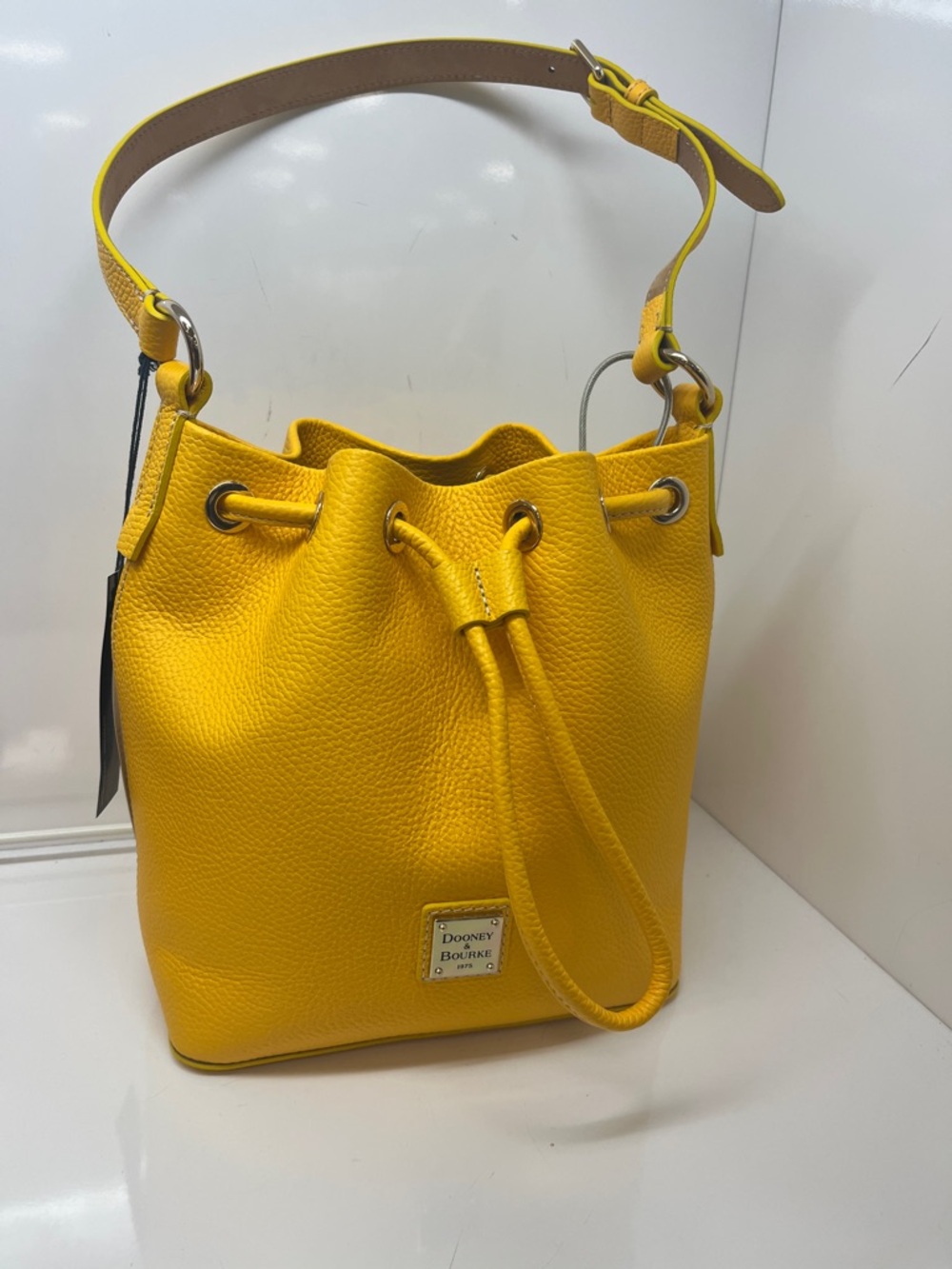Dooney & Bourke Bright Yellow Pebbled Leather Drawstring Bucket Bag